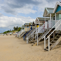 Buy canvas prints of Wells Beach Huts by Adrian Searle