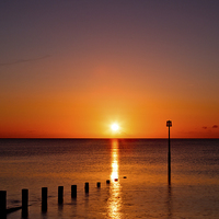 Buy canvas prints of Teignmouth Beach Sunrise by Tracey Yeo