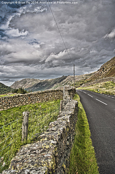 Cumbrian mountain road Picture Board by Brian Fry