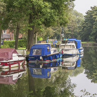 Buy canvas prints of River reflections  by Brian Fry