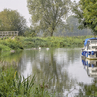 Buy canvas prints of Early autumn river scene  by Brian Fry