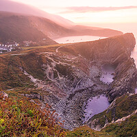 Buy canvas prints of Lulworth Cove & Stair Hole sunrise by Kevin Browne