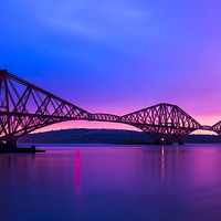 Buy canvas prints of Forth Bridge in Colourful sky by Kevin Ainslie