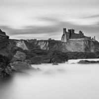 Buy canvas prints of Castle upon misty sea. by Kevin Ainslie