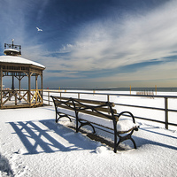 Buy canvas prints of Winter on the Boardwalk by Kevin Ainslie