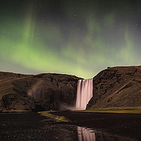 Buy canvas prints of Skogafoss Aurora by Kevin Ainslie