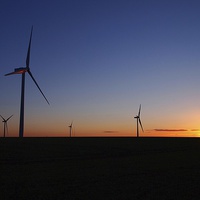 Buy canvas prints of  Wind turbines at sunset by Gerald Robinson