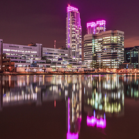 Buy canvas prints of Pink lights at Canary Wharf by John Ly