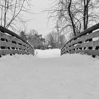 Buy canvas prints of Snow covered bridge. by Jeffrey Evans
