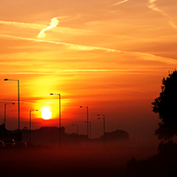 Buy canvas prints of Misty Sunset by Graham Beerling