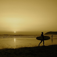 Buy canvas prints of Surfer in sepia by Helen Cooke