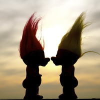 Buy canvas prints of troll lovers in the sunset by Helen Cooke