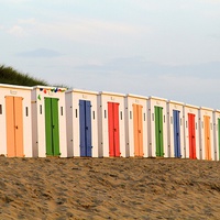Buy canvas prints of Woolacombe beach huts by Helen Cooke