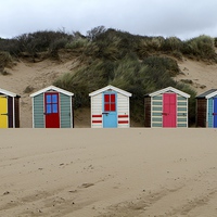 Buy canvas prints of Beach huts at Saunton sands  by Helen Cooke