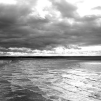 Buy canvas prints of Stormy Saunton sands  by Helen Cooke