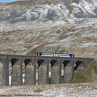 Buy canvas prints of Ribblehead Viaduct in Winter by Keith Douglas
