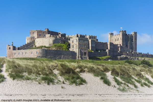 Bamburgh Castle from the beach Picture Board by Keith Douglas
