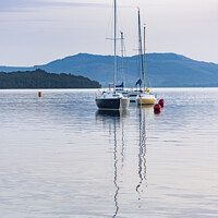 Buy canvas prints of Boats moored in Loch Lomond by Keith Douglas