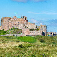 Buy canvas prints of Bamburgh Castle from the South East by Keith Douglas