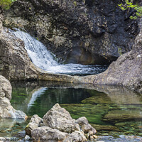 Buy canvas prints of Reflections in the Fairy Pools by Keith Douglas