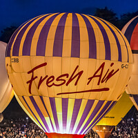 Buy canvas prints of Enchanted Nightglow: Bristol's Air Balloon Fiesta by Keith Douglas