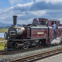 Buy canvas prints of The steam engine, Merddin Emrys at Porthmadog by Keith Douglas