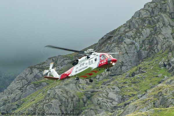 HM Coastguard Rescue Helicopter in Snowdonia Picture Board by Keith Douglas