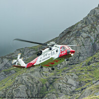 Buy canvas prints of HM Coastguard Rescue Helicopter in Snowdonia by Keith Douglas