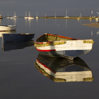 Buy canvas prints of Boat reflections by Keith Douglas
