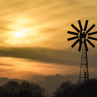 Buy canvas prints of Windmill at sunset by Keith Douglas