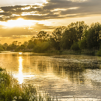 Buy canvas prints of Sunset on the river by Keith Douglas