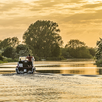 Buy canvas prints of Evening cruise on the river by Keith Douglas