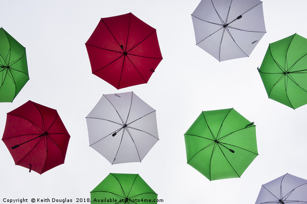 Italian Umbrellas in the sky Picture Board by Keith Douglas