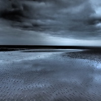 Buy canvas prints of Blue reflections, winter beach by Sally Coleman