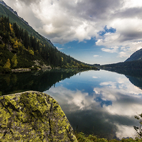 Buy canvas prints of Reflection in Morskie oko lake by Laco Hubaty