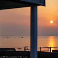Buy canvas prints of Sunrise Through Dovercourt Beach Huts by matthew  mallett