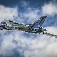 Buy canvas prints of  Vulcan Bomber Over The Sea by matthew  mallett