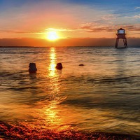 Buy canvas prints of  Dovercourt Beach Sunrise Today by matthew  mallett