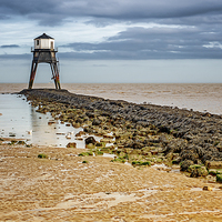 Buy canvas prints of Lighthouse at Low Tide  by matthew  mallett