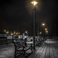 Buy canvas prints of  Sitting Under The Lights Of Halfpenny Pier harwic by matthew  mallett