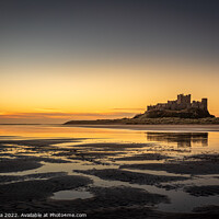 Buy canvas prints of Bamburgh Castle and Beach Reflections At Sunrise by Inca Kala