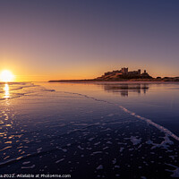 Buy canvas prints of Sunrise Over Bamburgh Castle Beach and Waves by Inca Kala