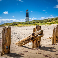 Buy canvas prints of Spurn Point Lighthouse and Sea Defenses by Inca Kala