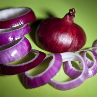 Buy canvas prints of Red onion slices by anna collins
