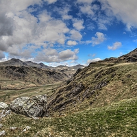 Buy canvas prints of Hardknott Pass overlooking River Esk by Robert Maddocks