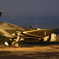 Buy canvas prints of Spitfire at Night by Barry Burston