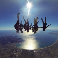 Buy canvas prints of Skydive freefly over the bay by Ewan Cowie