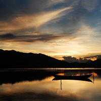 Buy canvas prints of Vietnam sunset over the lagoon by Ewan Cowie