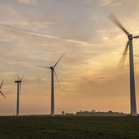 Buy canvas prints of Sunset over Somerton Wind Turbines by James Taylor