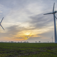 Buy canvas prints of Sunset Over Looking Somerton Wind Farm by James Taylor